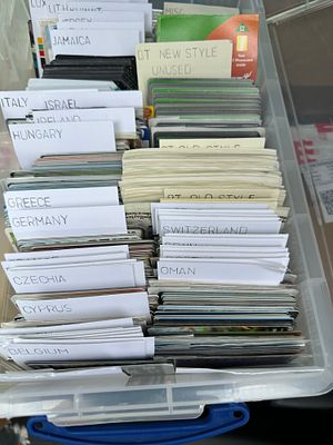 Collection of phonecards, unused and used, GB and worldwide sorted in a strong plastic storage 