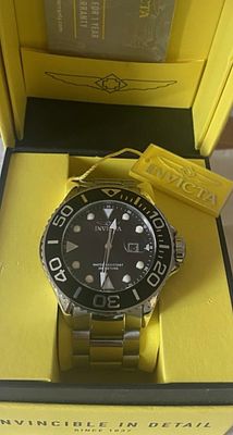 INVICTA gents divers watch 300m Water resistant black face stainless steel bracelet