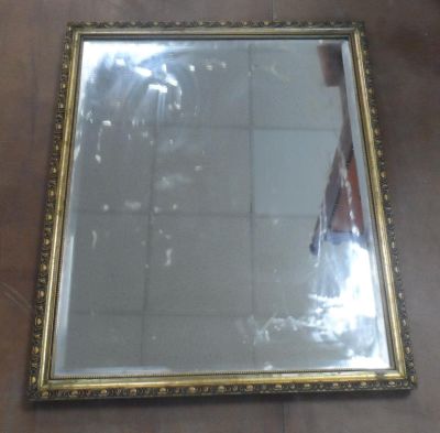 Large, bevelled edged framed wall mirror