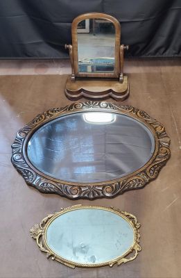 Two wall mirrors and a table top mirror (3)
