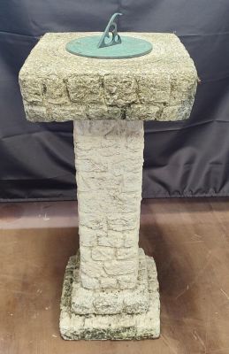 A stone sundial with removable top