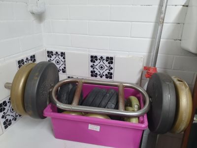 Collection of weights and barbells