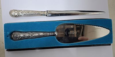 Silver handled cake slice and also a silver handled letter opener (2)
