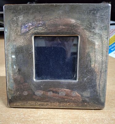 Modern, free-standing Sheffield silver hallmarked wide-framed photo frame