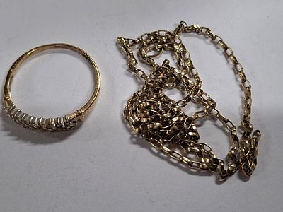 Ladies 9ct yellow gold ring infused with a large quantity of small round cut diamonds together 