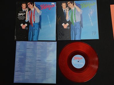 Two The Darkness "Dreams on toast" LP's, one is signed and the other is factory sealed (2)