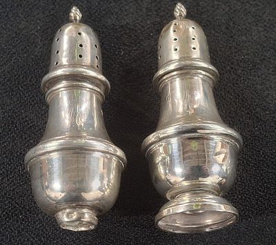 Pair of hallmarked silver pepperettes, 57.5 grams