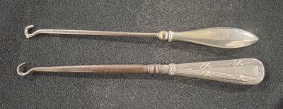 Chester hallmarked silver handled button hook together with a Birmingham hallmarked silver 