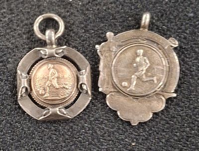 Two silver, football related old hallmarked silver fobs, 13.7 grams (2)