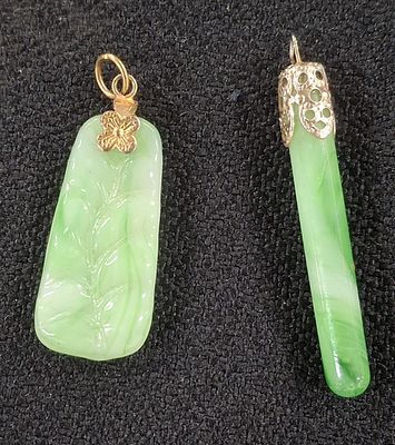 Two Jade carved pendants (2)