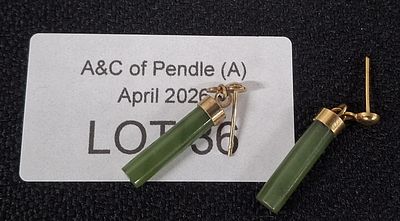 Pair of dark Jade earrings set in unmarked gold coloured metal settings