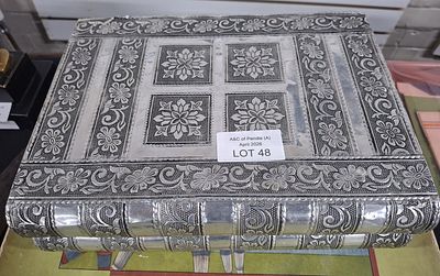 Jewellery box in the form of a white metal book with costume jewellery contents