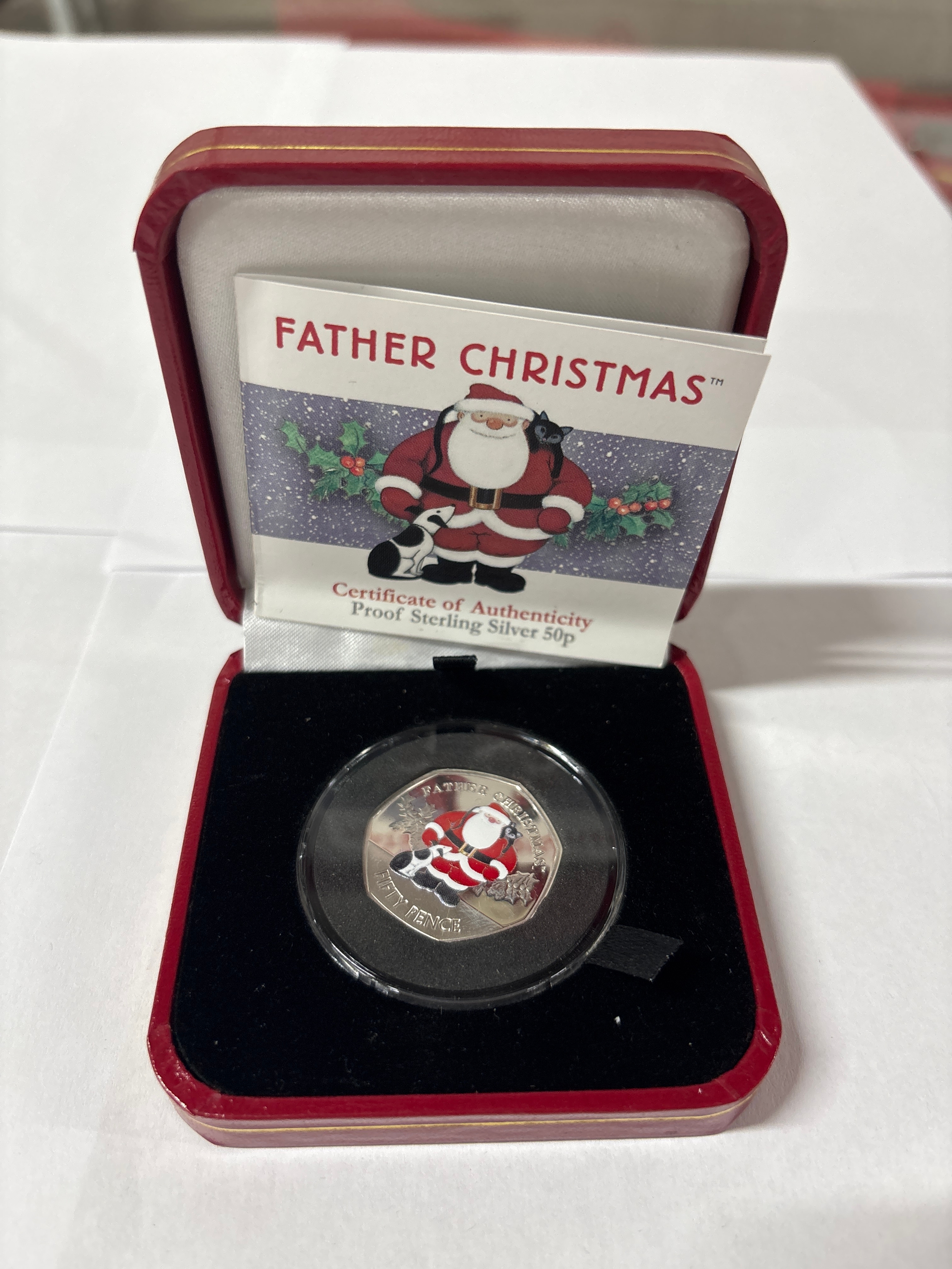 Boxed father Christmas sterling silver 50p coin