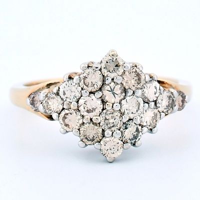 14K Yellow Gold 1.70ctw Diamond Cluster Ring A distinctive diamond cluster ring crafted in 