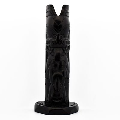 Hand-Carved Black Totem Pole Sculpture. ABV540 Description: This striking hand-carved totem pole 