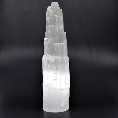 Carved Selenite Crystal Tower Mineral Specimen. Tall carved selenite crystal tower with a 