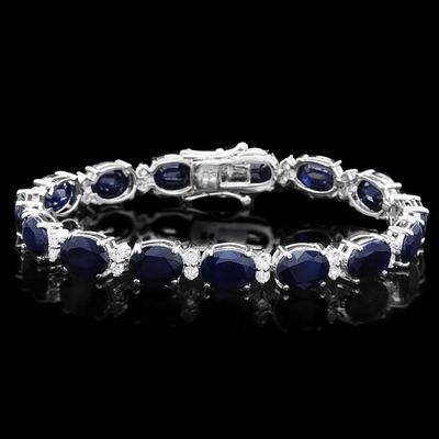 14k Gold 40.00ct Sapphire & 1.50ct Diamond Bracele. This solid 14K white gold bracelet is set 