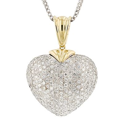 18K Two Tone Gold 3.90ctw Diamond Heart Pendant. Estimated Retail Replacement Value: $31,350.00 