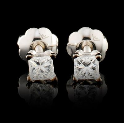 14K Gold 0.20ctw Diamond Earrings. These solid 14K white gold earrings feature princess-cut 