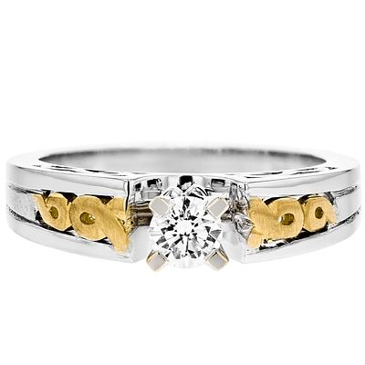 18K Two-Tone 0.35ctw Diamond Engagement Ring. This 18K white and yellow gold ring is set with a 