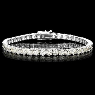 18k White Gold 12.00ct Diamond Tennis Bracelet. Estimated Retail Replacement Value: $48,900.00 