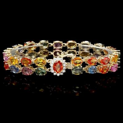 14k Gold 35.00ct Sapphire & 0.50ct Diam Bracelet. This solid 14K yellow gold bracelet is set 
