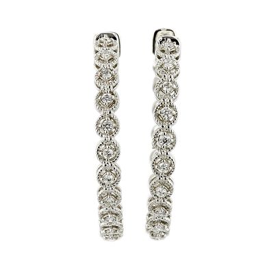 14K White Gold 0.65ctw Diamond Hoop Earrings. Estimated Retail Replacement Value: $6,317.00 Ref: 