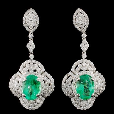 18K Gold 5.75ct Emerald & 4.30ct Diamond Earring. These 18K white gold earrings feature green 