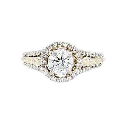 14K Two-Tone Gold 1.45ctw Diamond Engagement Ring. This 14K yellow and white gold ring is set 