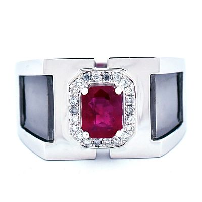 18k Gold 0.97ct Ruby & 0.12ct Diamond Ring. This 18K white gold ring showcases reddish pink 