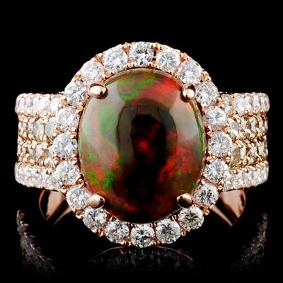 14K Gold 2.30ct Opal & 1.75ct Fancy Diamond Ring. Estimated Retail Replacement Value: $11,320.00 