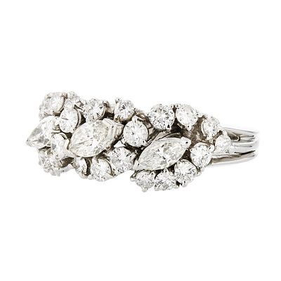 Platinum 1.50ctw Round & Marquise Diamond Ring. This platinum gold ring is set with round and 