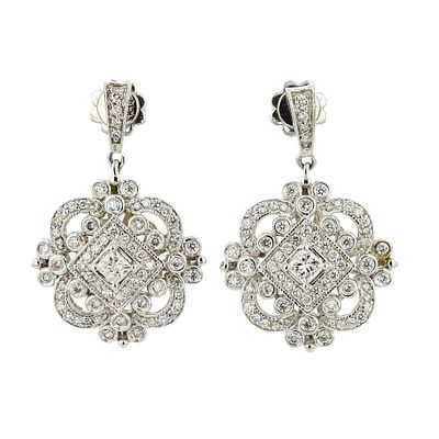 14K White Gold 1.65ctw Diamond Dangling Earrings. Estimated Retail Replacement Value: $12,670.00 