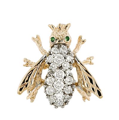 14K Yellow Gold 1.00ctw Diamond & Emerald Brooch. This 14K yellow gold brooch combines green 