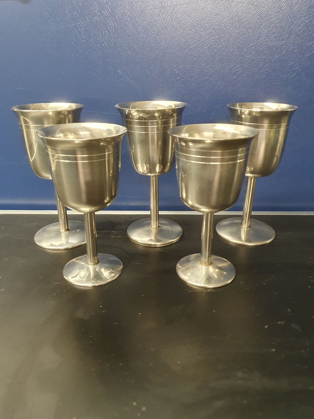 Lot 170: A Set of Five Pewter Wine Goblets in the Style of Robert Welch for Old Hall