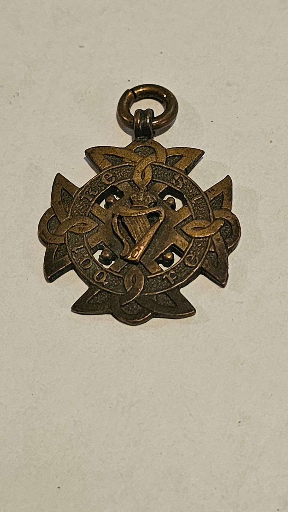 Lot 185: Irish Celtic Revival Bronze Military Commemorative Watch Fob 1900