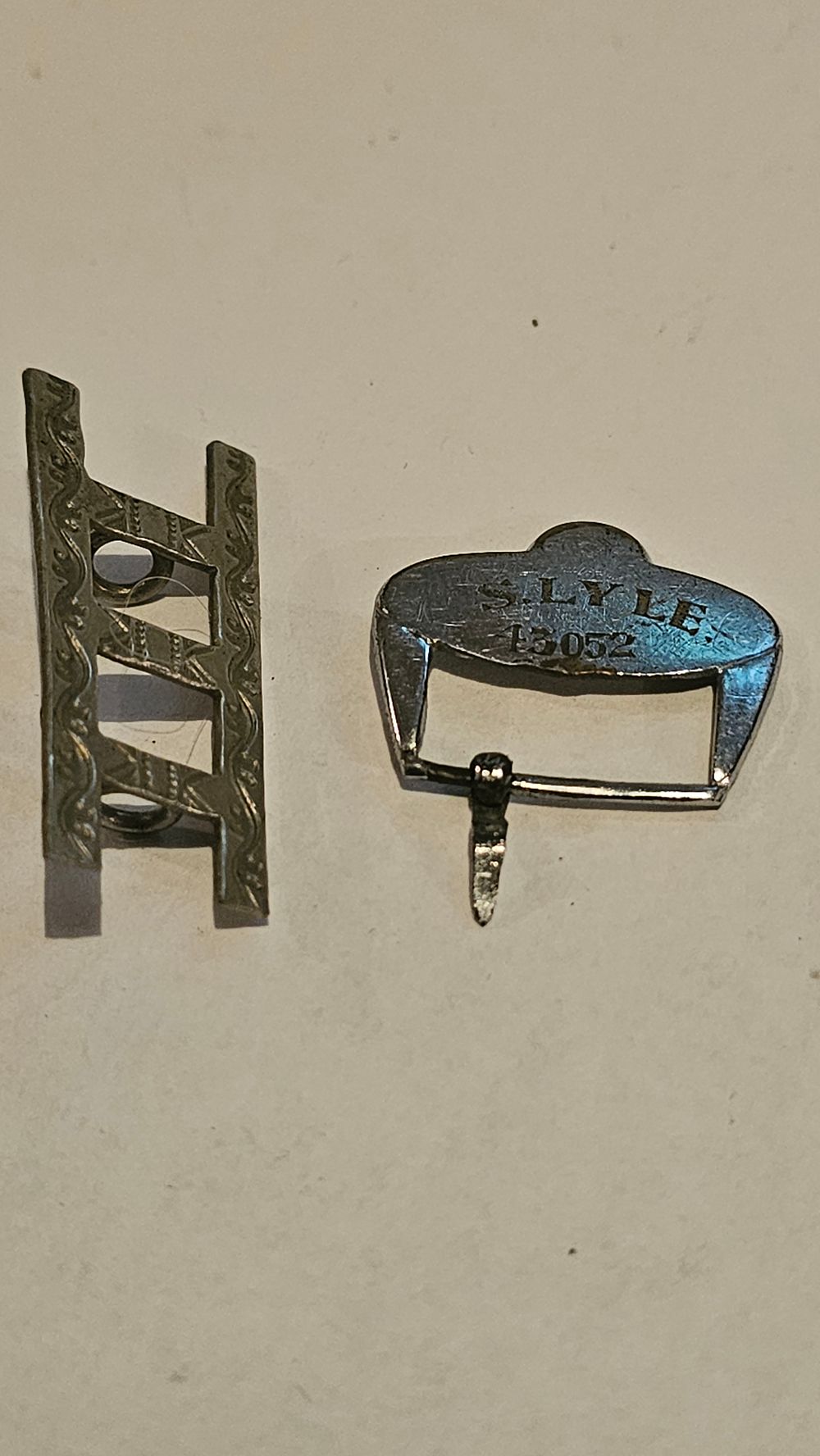 Lot 189: Two Items of British Military Badges and Personal Equipment Including a Buckle for S. Lyle