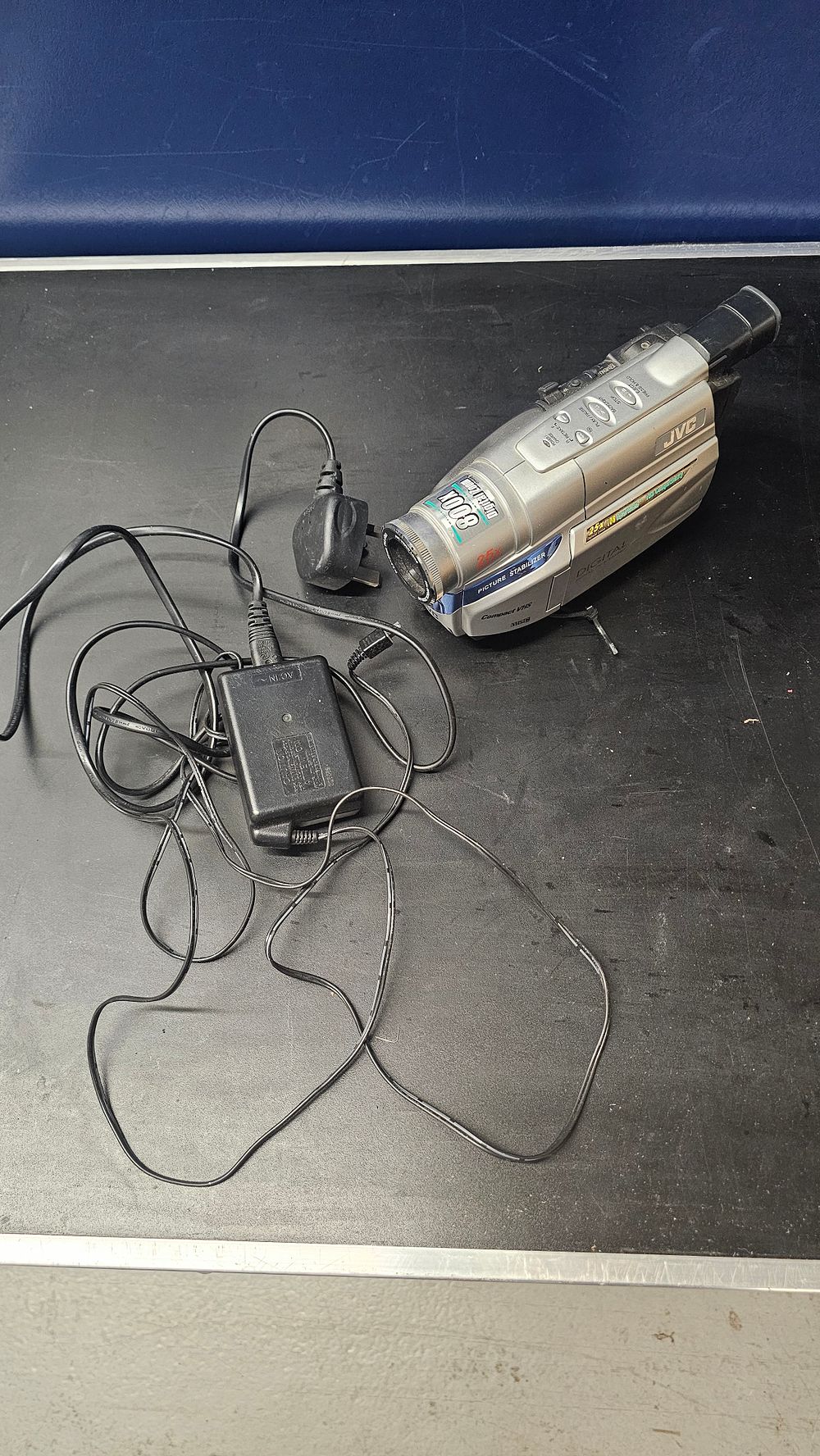 Lot 283: JVC Compact VHS Camcorder and AC Adapter
