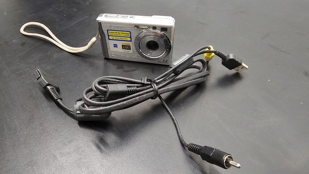 Lot 3: Sony Cyber-shot DSC-W80 7.2MP Digital Camera with Accessory Cable