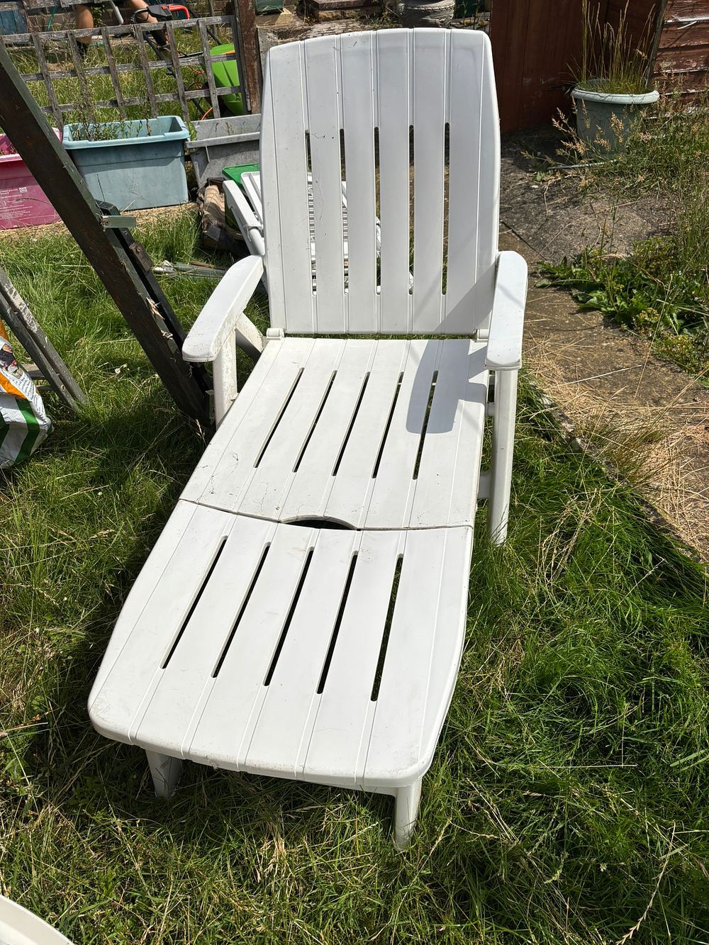 Lot 230: A white plastic folding garden sun lounger