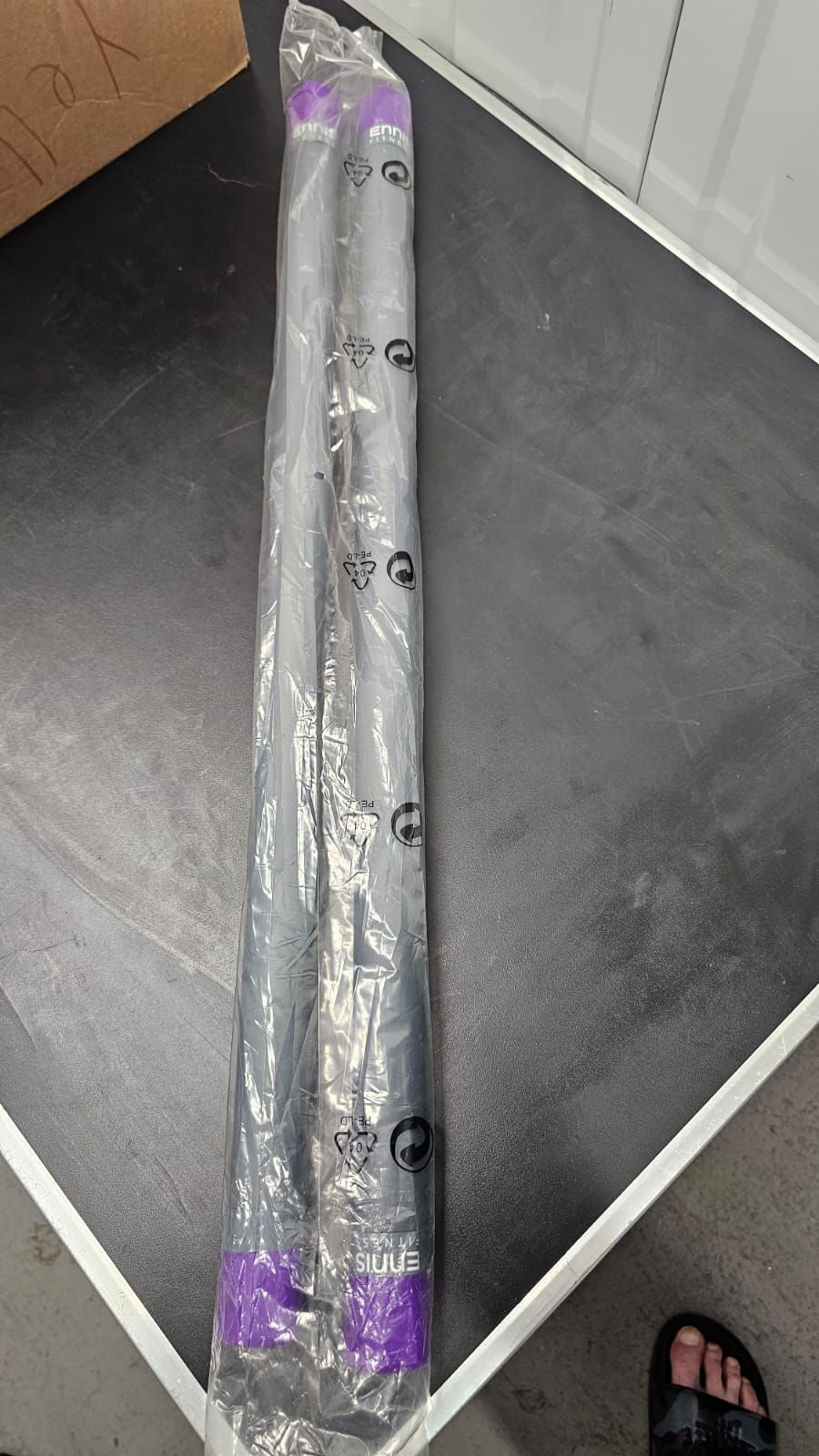 Lot 151: A Pair of Ennis Fitness Weighted Bars