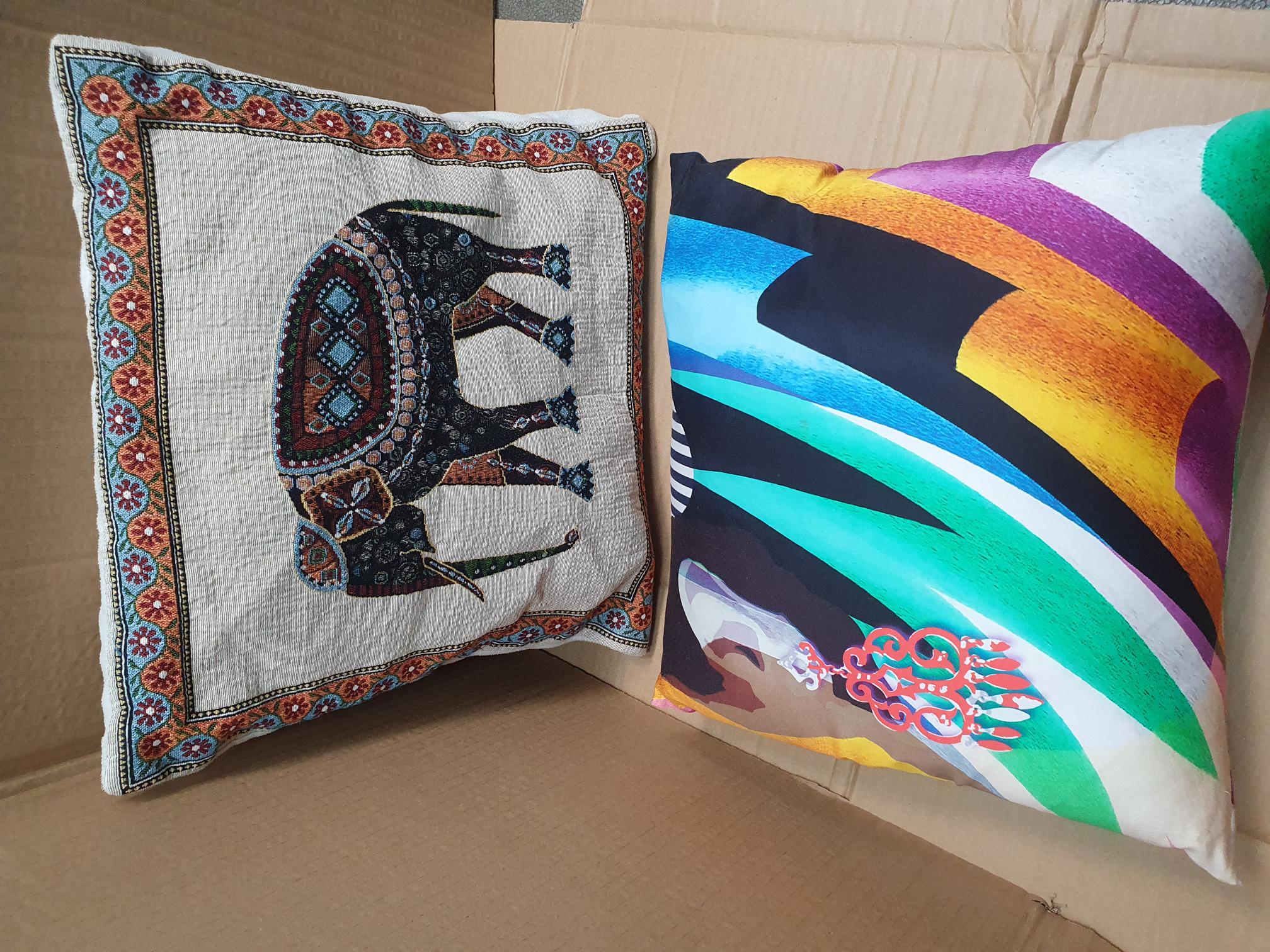 Two Decorative Cushions Including an Elephant Tapestry Motif and a Stumpf Abstract Print