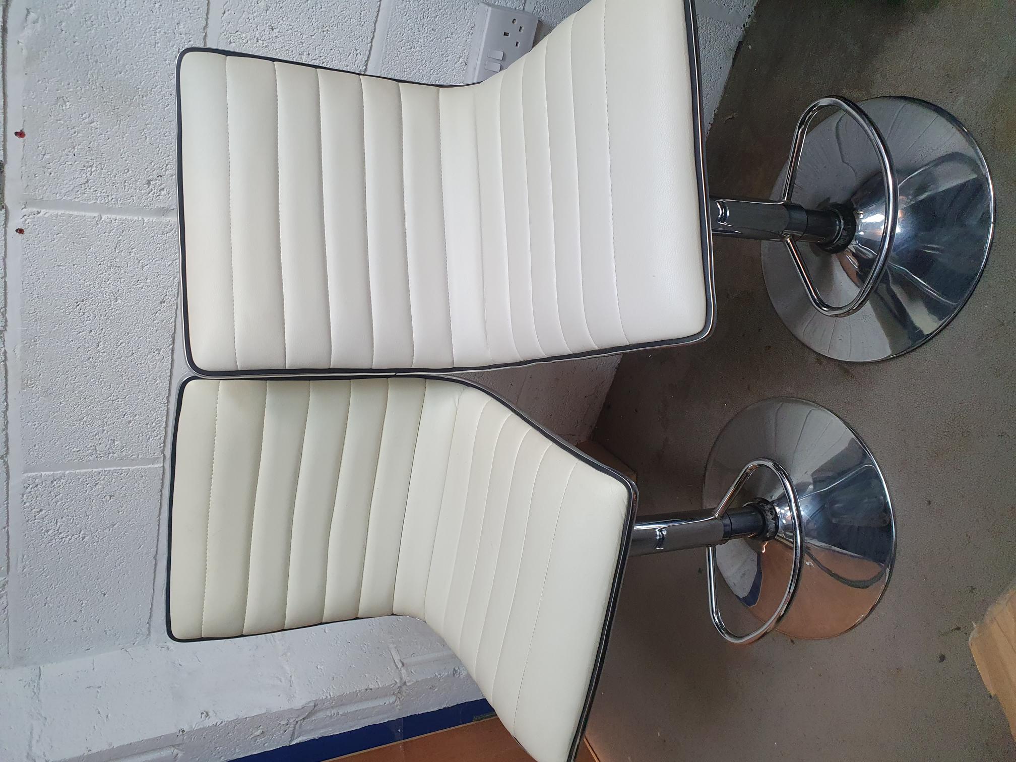 A Pair of Contemporary Adjustable Faux Leather Bar Stools