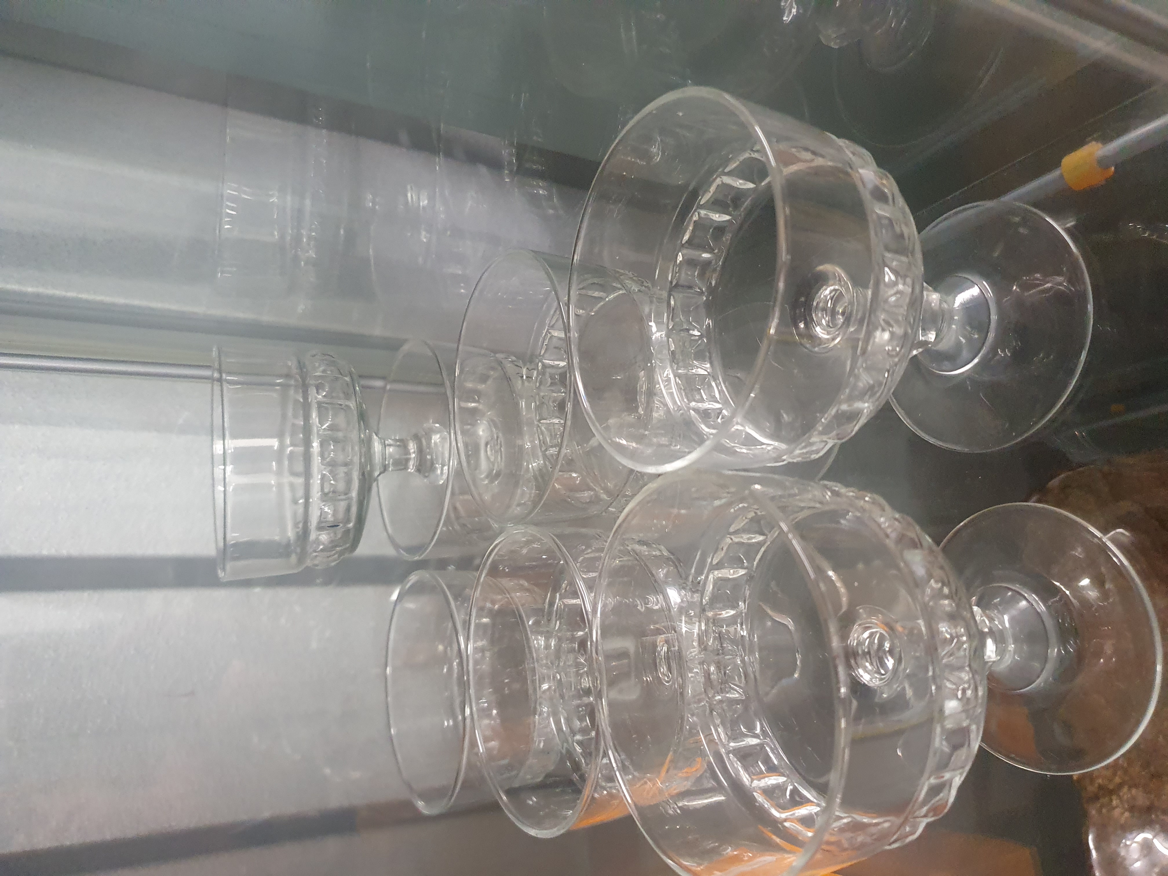 A Set of Arcoroc Clear Pressed Glass Dessert Dishes