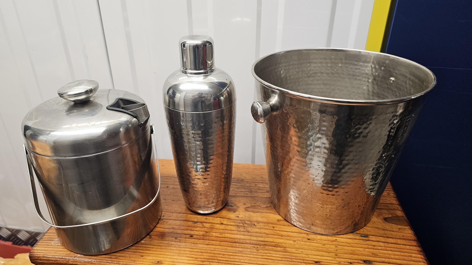 A Trio of Casa Couture Hammered Stainless Steel Barware Items