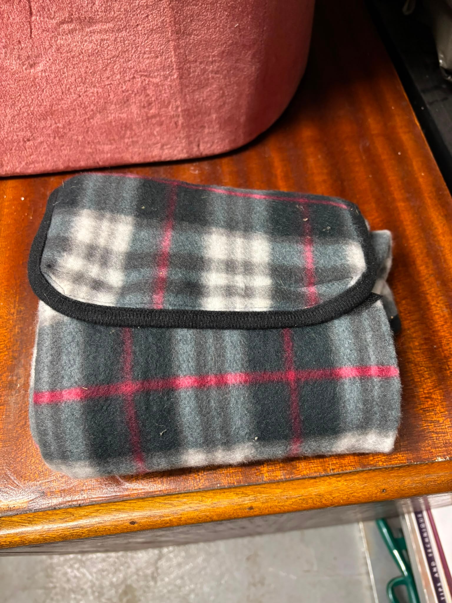 A Modern Fleece Travel Rug with Integrated Handle and Plaid Pattern, New