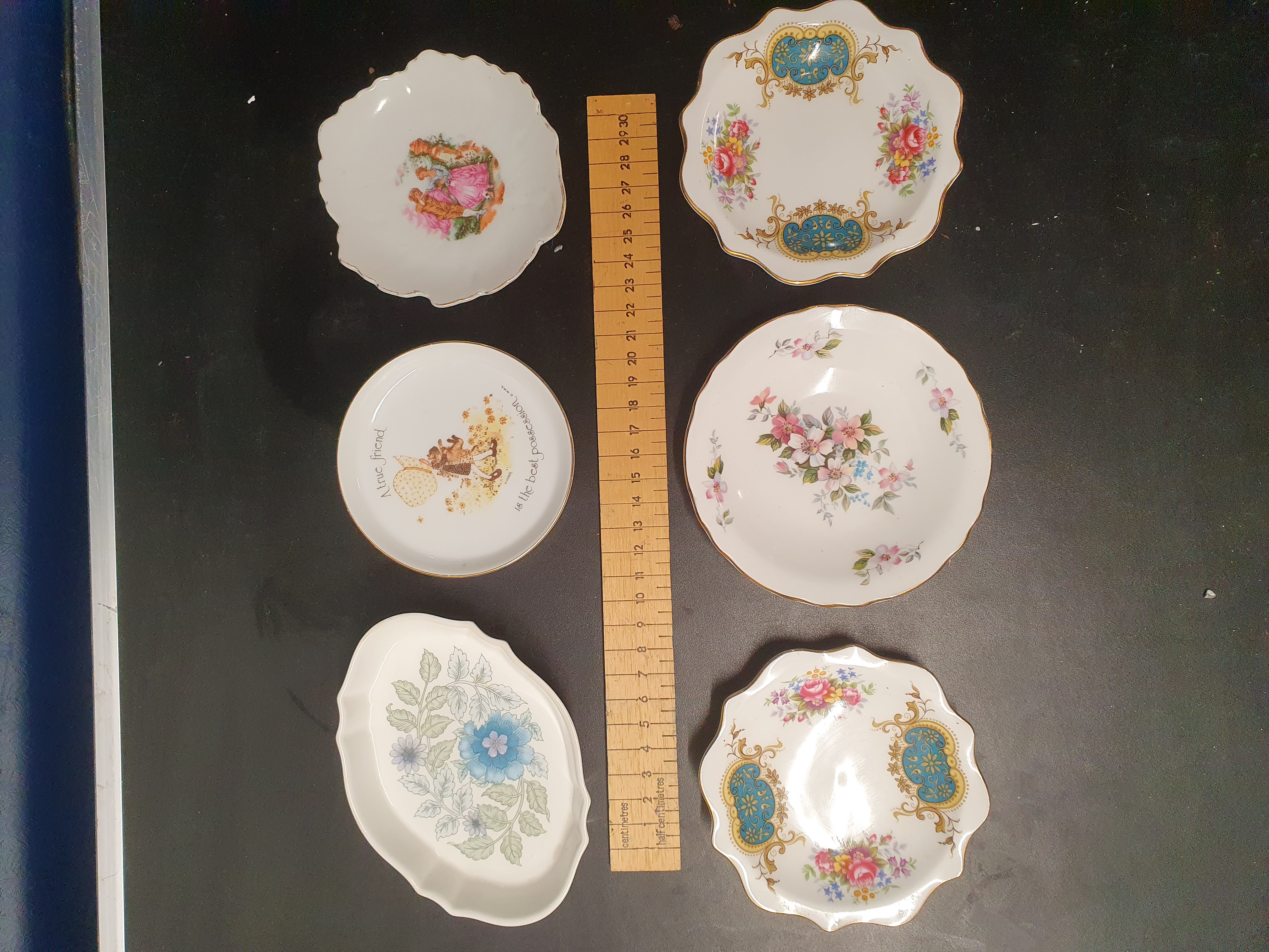 An Assortment of Decorative English and Foreign Bone China and Porcelain Pin Dishes and Saucers including Royal Albert and Wedgwood