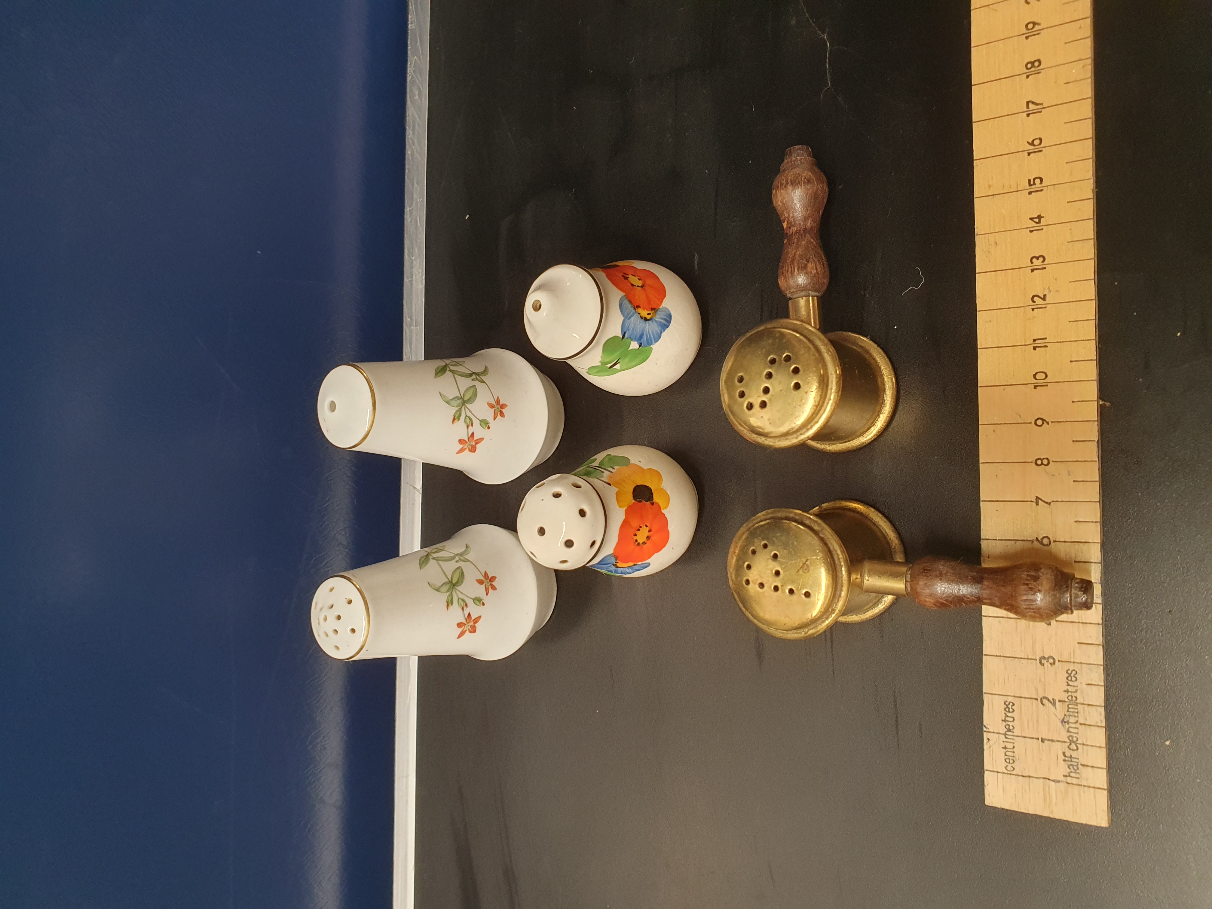 A Collection of Vintage Porcelain and Brass Condiment Shakers