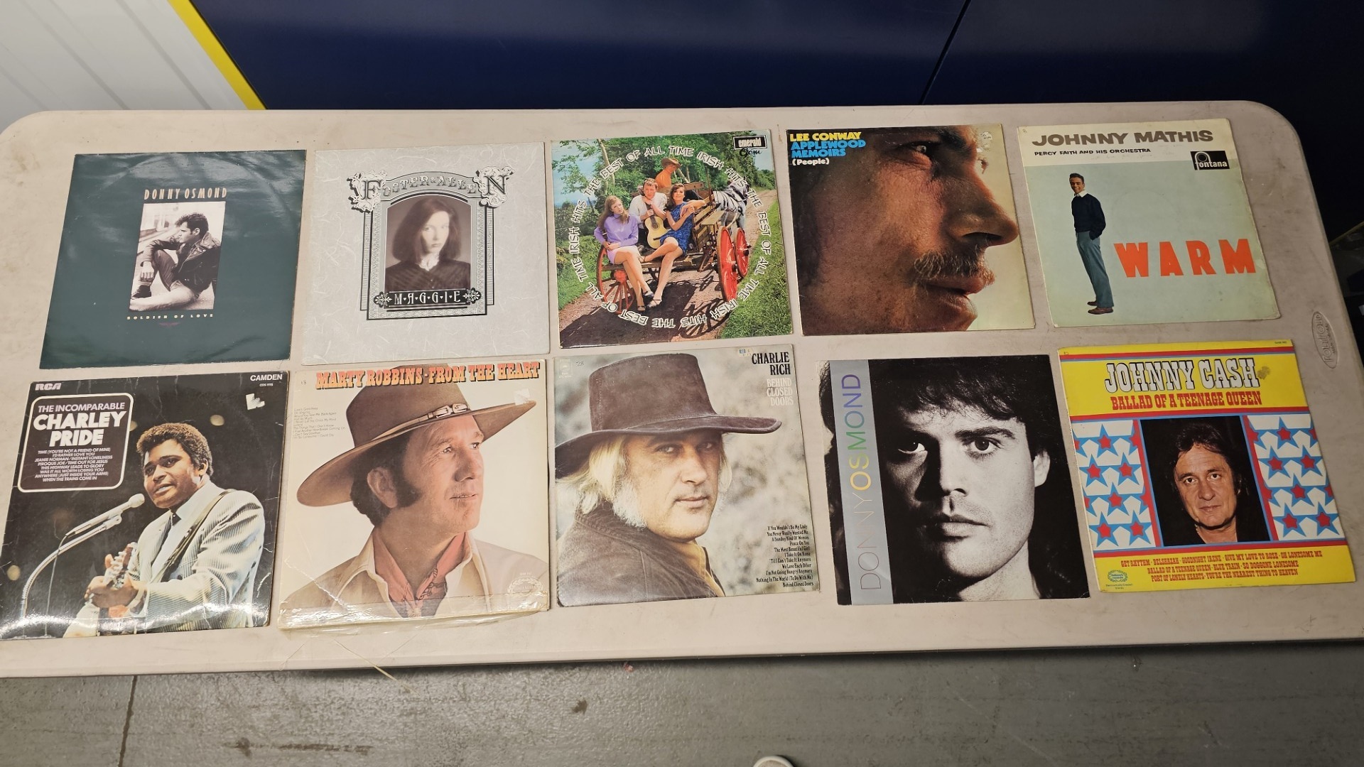 A Collection of Vintage Vinyl LP Records Including Johnny Cash, Charley Pride, and Donny Osmond