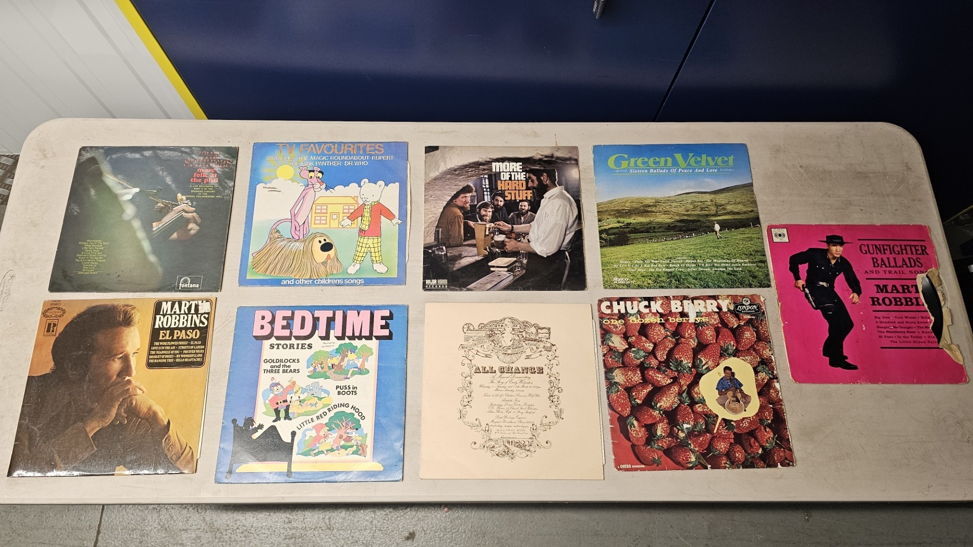 A Collection of Nine Vintage Vinyl LP Records Including Marty Robbins, Chuck Berry, and The Dubliners